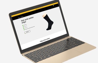 Webshop med salg af sorte sokker og med abonnementsløsning