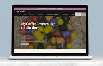 Abonnementswebsite med tilhørende shop med mdr. omsætning på 100.000 kr. 