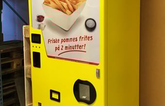 Pommes frites automat og koncept