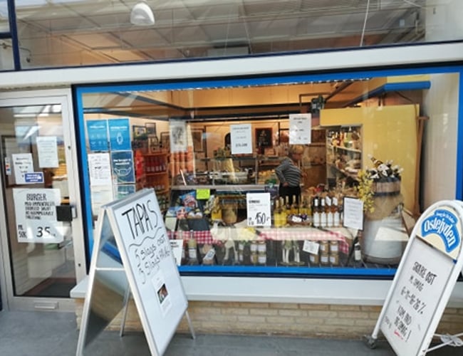 Ostebutik i attraktivt butikscenter i Århus N - 28 års ejerskab