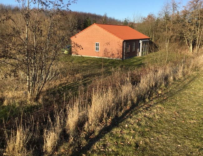 Byggegrund i Odense med 1 hus og ret til 10 mere