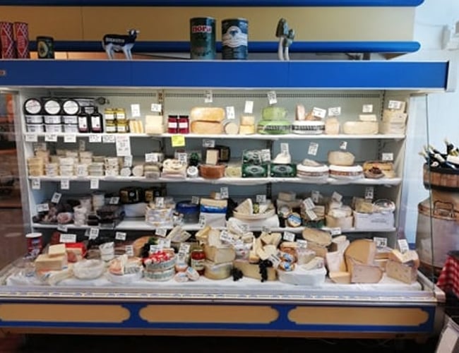 Ostebutik i attraktivt butikscenter i Århus N - 28 års ejerskab