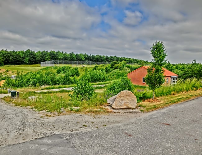 Byggegrund i Odense med 1 hus og ret til 10 mere