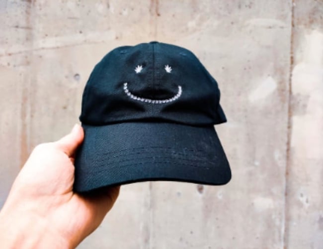 Webshop JUSTFIFTY - salg af CAPS til 50 KR