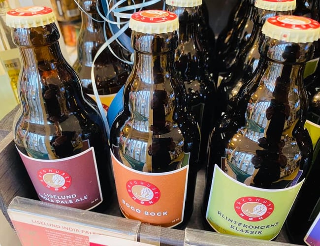 Stor kiosk/specialbutik i Horsens med webshop sælges pga sygdom. - Overskud før skat: 650.000 kr.