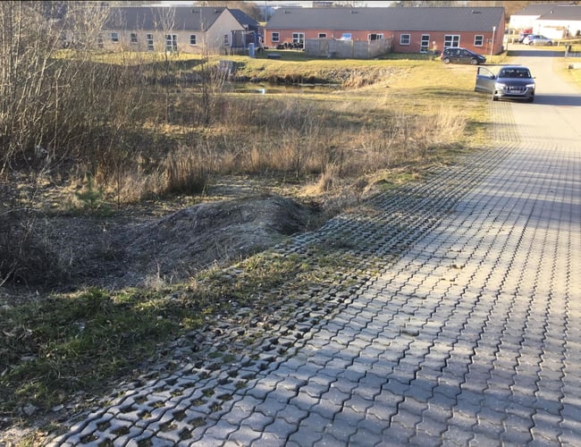 Byggegrund i Odense med 1 hus og ret til 10 mere